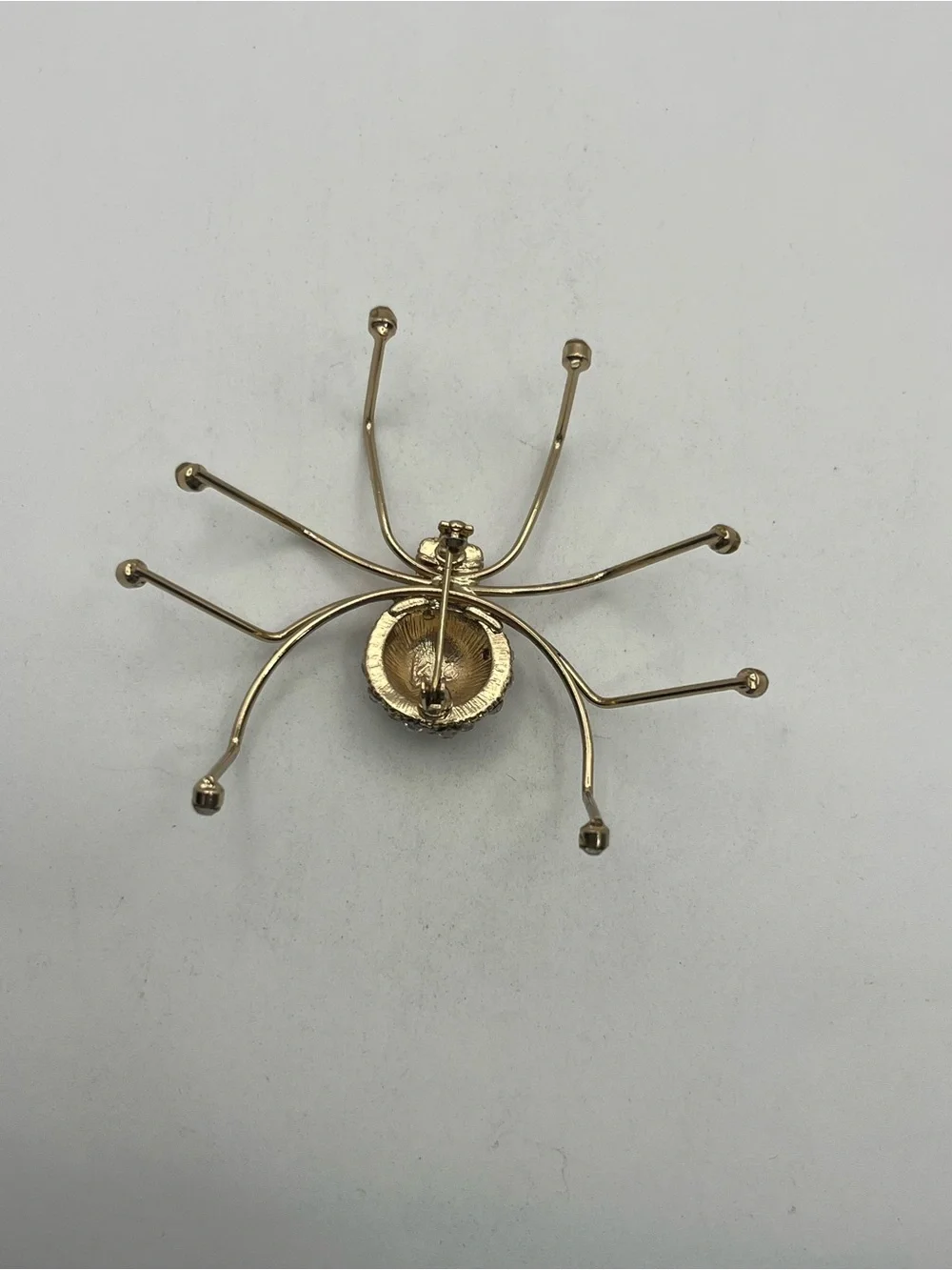 Spider insect gold tone clear rhinestone brooch pin